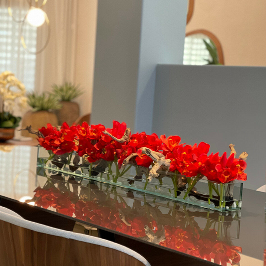 moderna casa vidrio jarrón con rojo cymbidiums