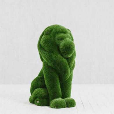 sentado león topiario